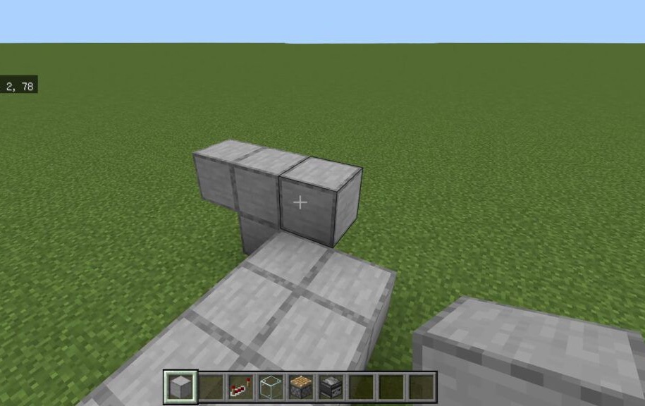 右手前にT字になるように石系ブロックを設置する